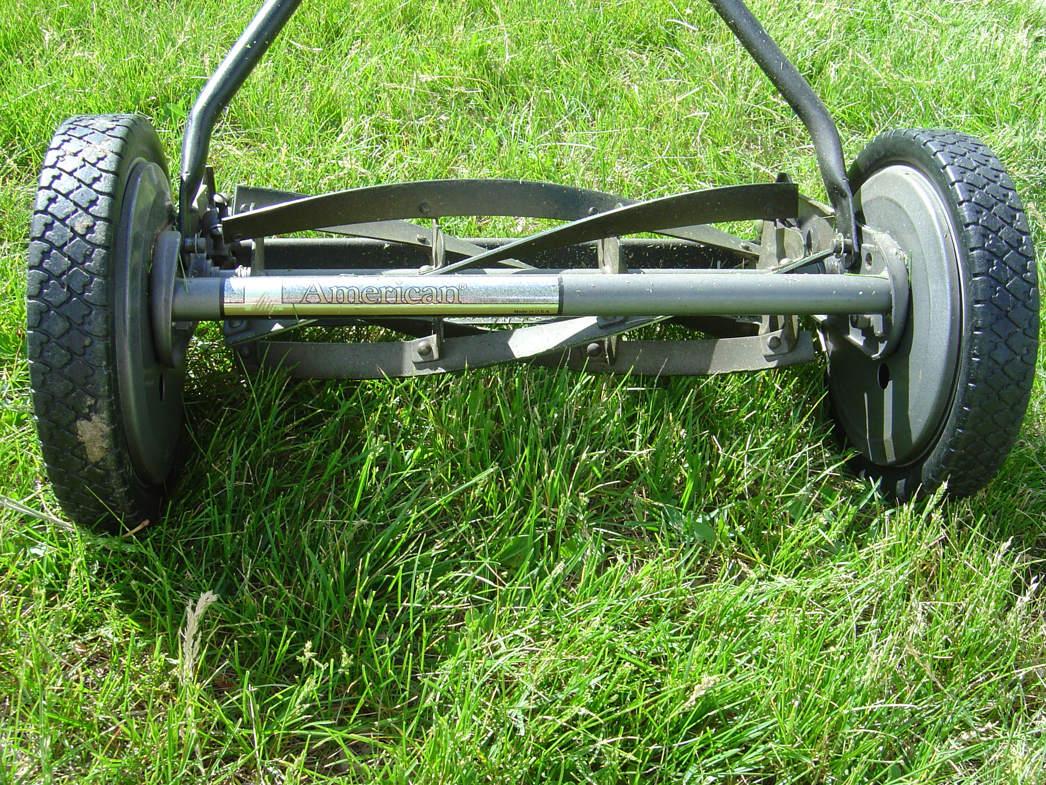 full view of a reel lawnmower after the restoration process was